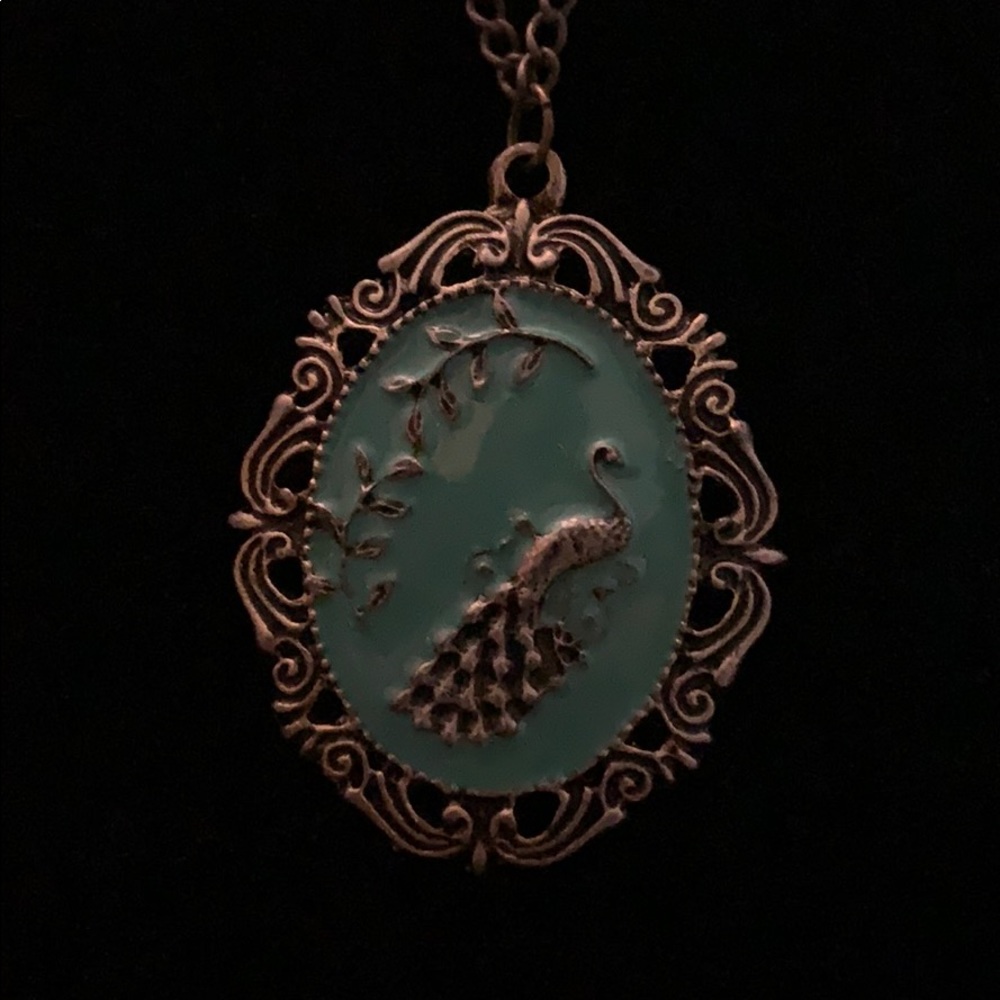 Ornate teal colored Peacock necklace